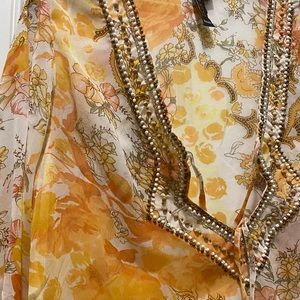 Beautiful vibrant Sheer flower pattern beaded bathing suit cover up. Never worn.